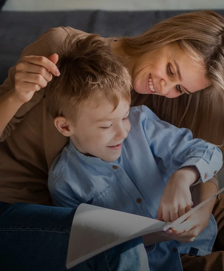 Mother helping her son with homework