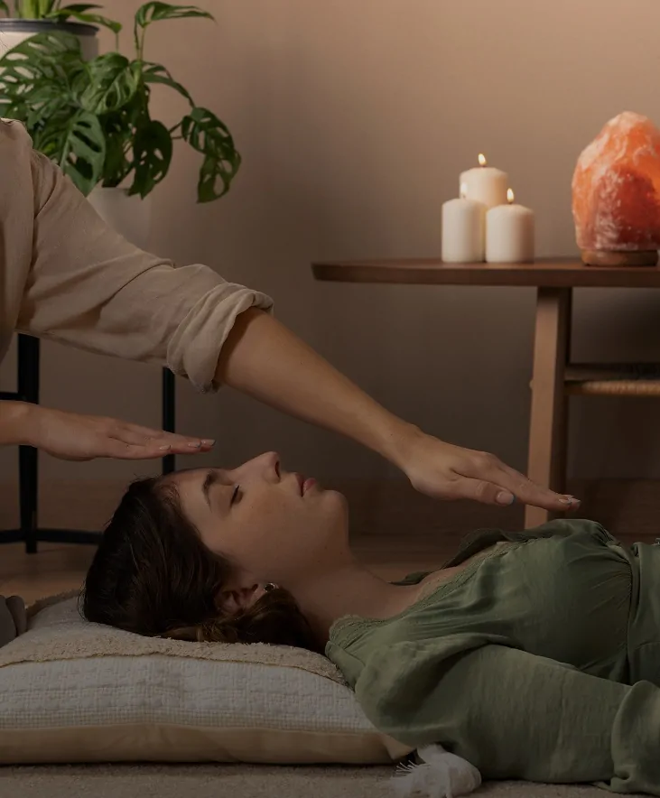 Woman relaxing during a somatic therapy session